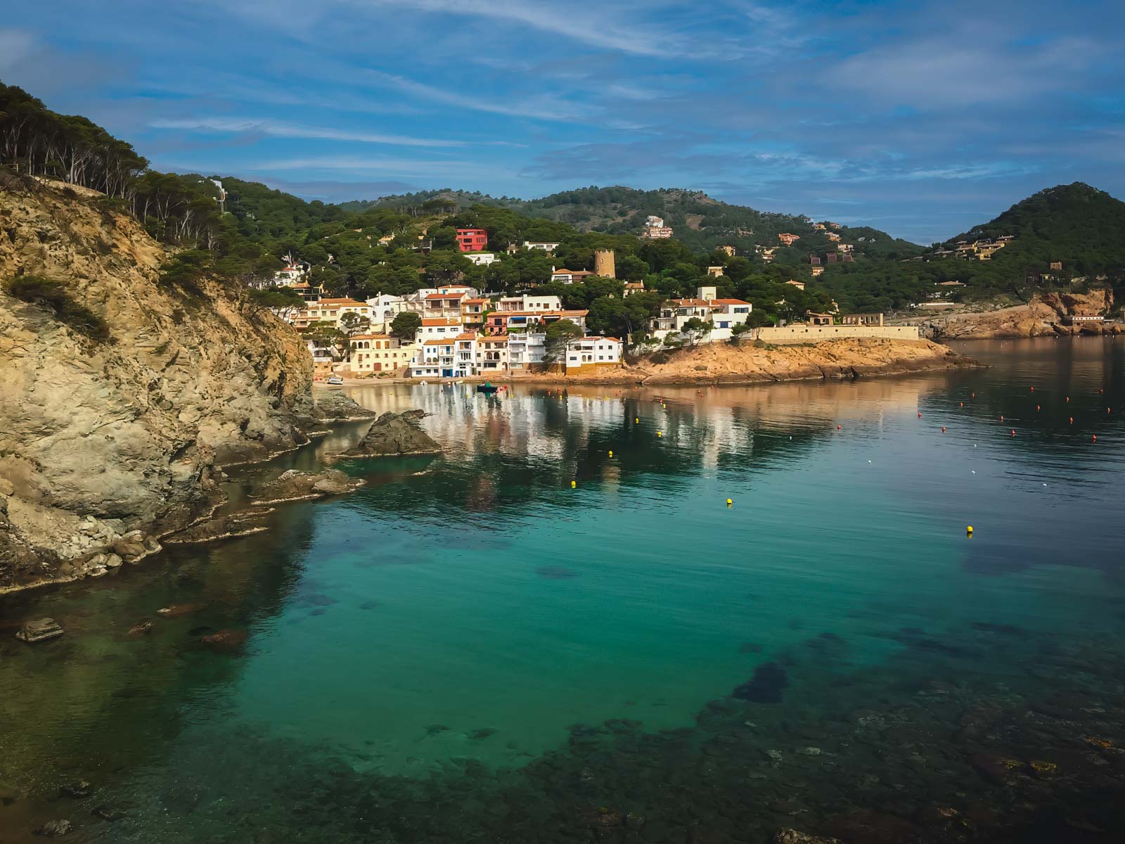 Best Day Trips from Barcelona Whitewashed houses in a quaint fishing village