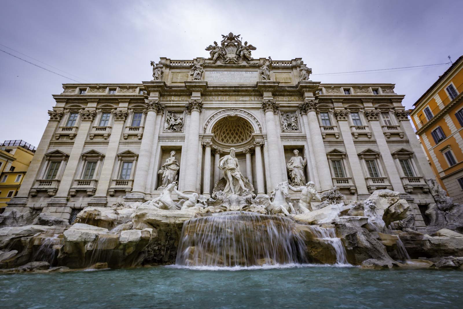 Enjoying the Trevi Fountain in the Evening on our one day in Rome