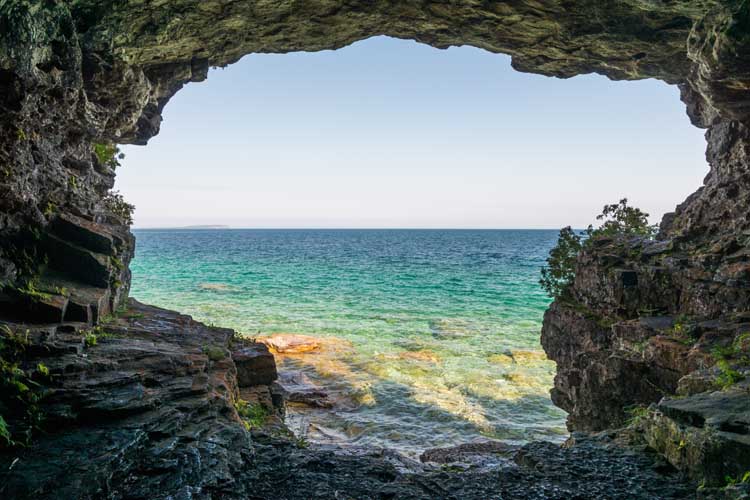 One of the best places to visit in ontario is the Tobermory Grotto